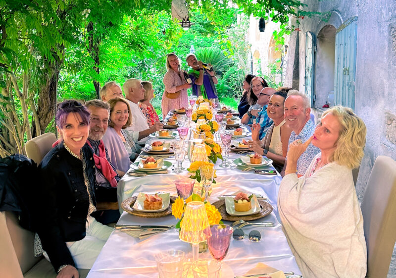 Provence tour guests enjoying a privately hosted dinner at friend, Chef Catherine's Provencal farmhouse.