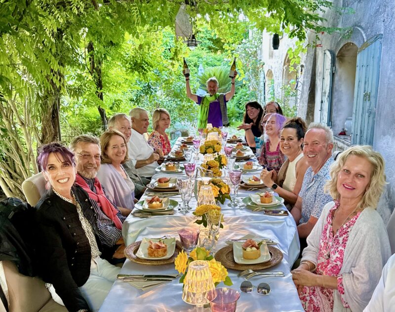 July 2024 Provence tour guests enjoying a fun dinner at our friend's home