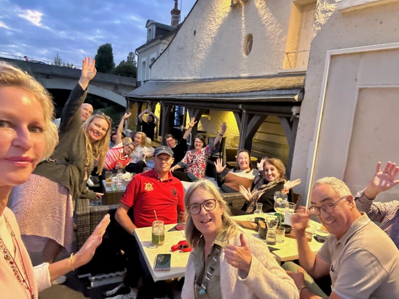 Evening aperitif with guests during France Off the Beaten Path Loire Valley tour.